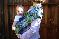 Sitting up, looking around Baby Sling